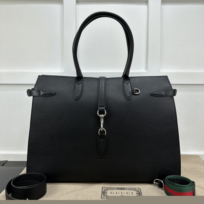 G*u*i top handle bags